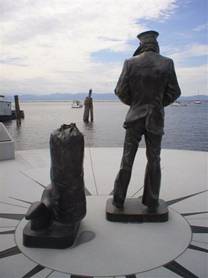 U.S. Navy Memorial Lone Sailor statue overlooking Lake Champlain, at Burlington, Vermont.